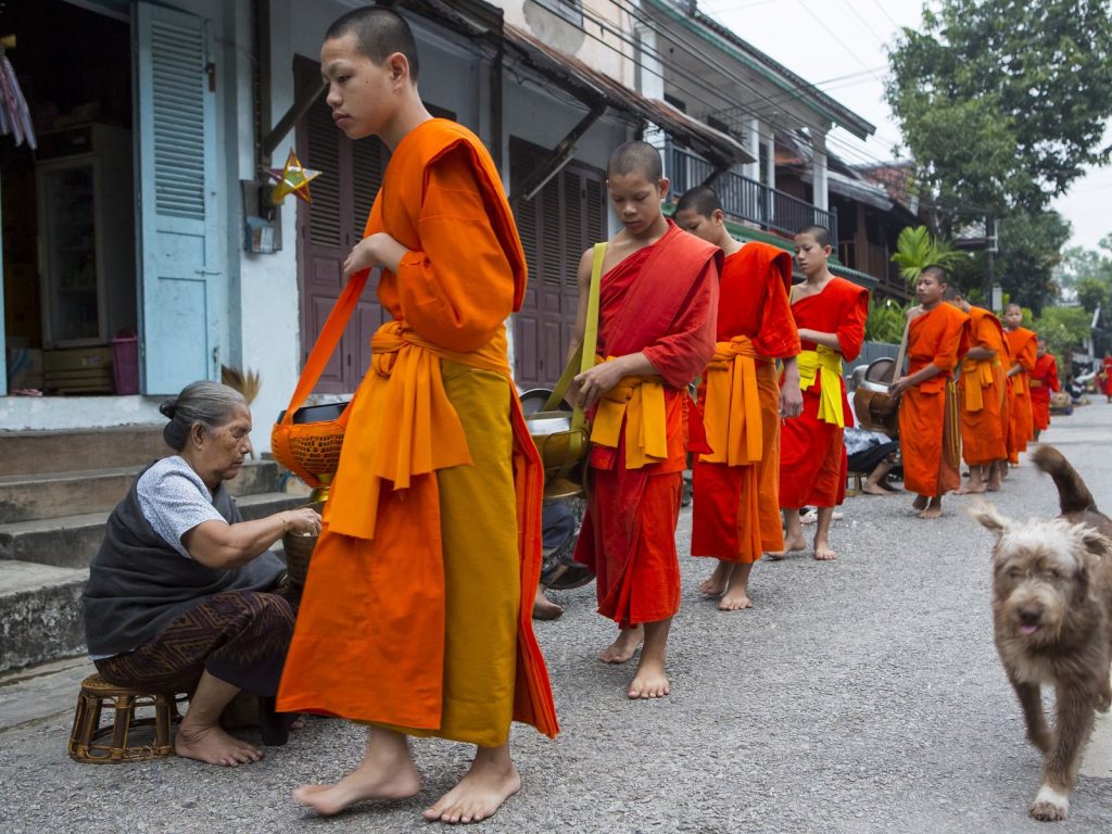 Walking through the Luang Prabang Street Market that Start Right after the Morning ALMS Ceremony!